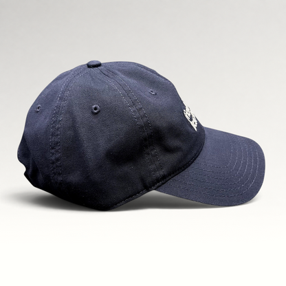 Raree Finds navy blue cotton twill dad hat with white embroidered text and a relaxed unstructured fit.
