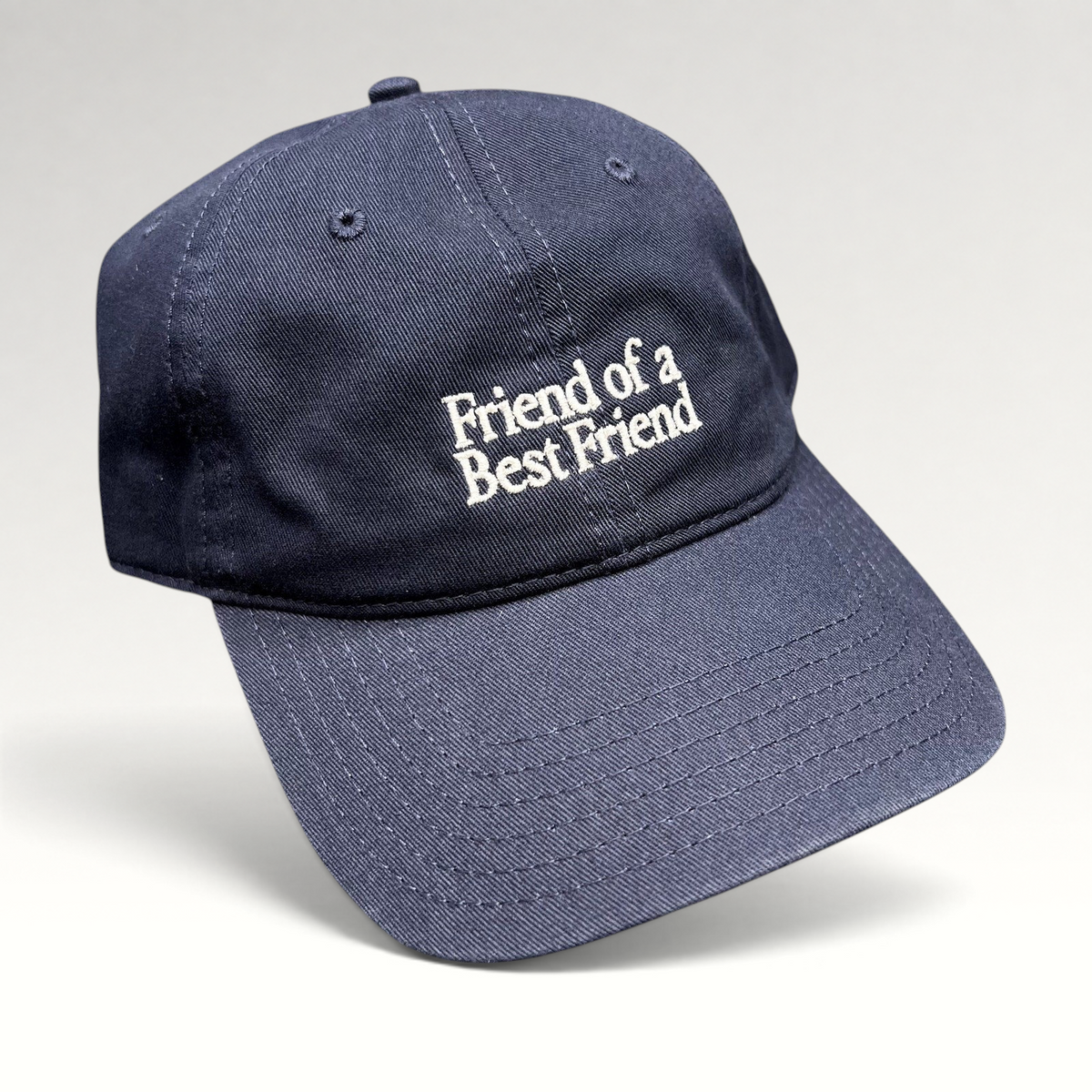 Raree Finds navy cotton twill dad hat with Friend Of A Best Friend white embroidery and curved brim