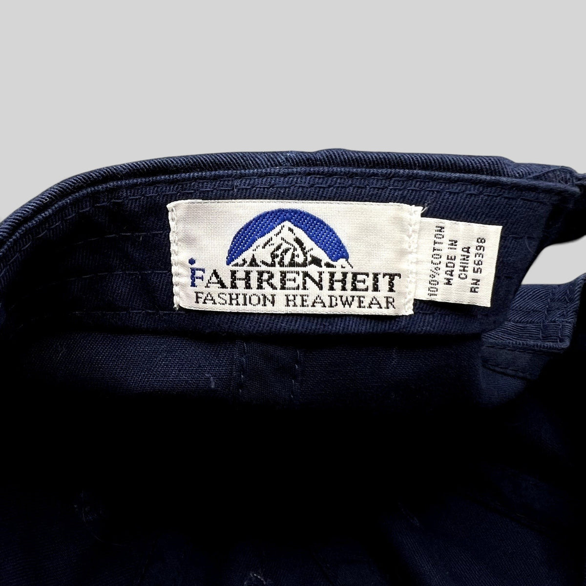 Raree Finds vintage navy blue cotton hat interior label by Fahrenheit Fashion Headwear