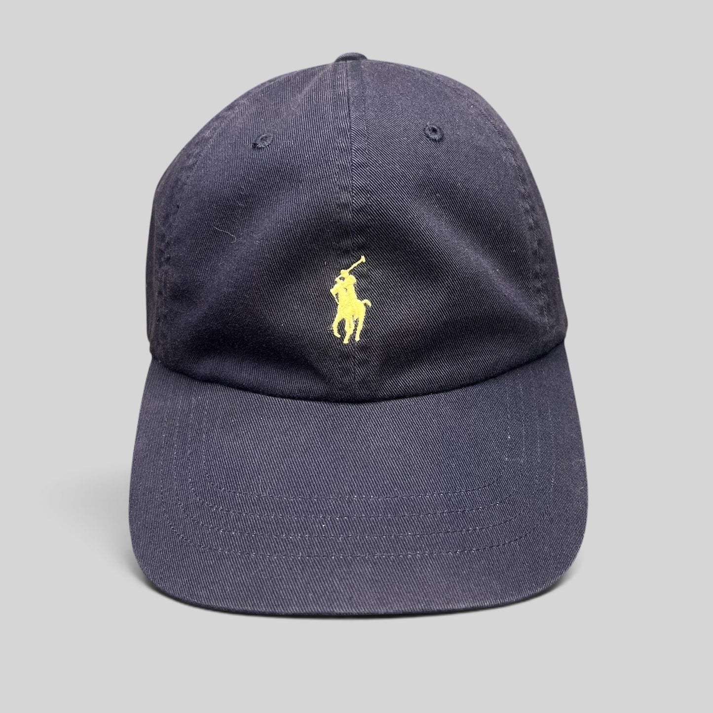 Raree Finds navy cotton chino baseball cap with a yellow embroidered Polo Ralph Lauren pony logo on the front