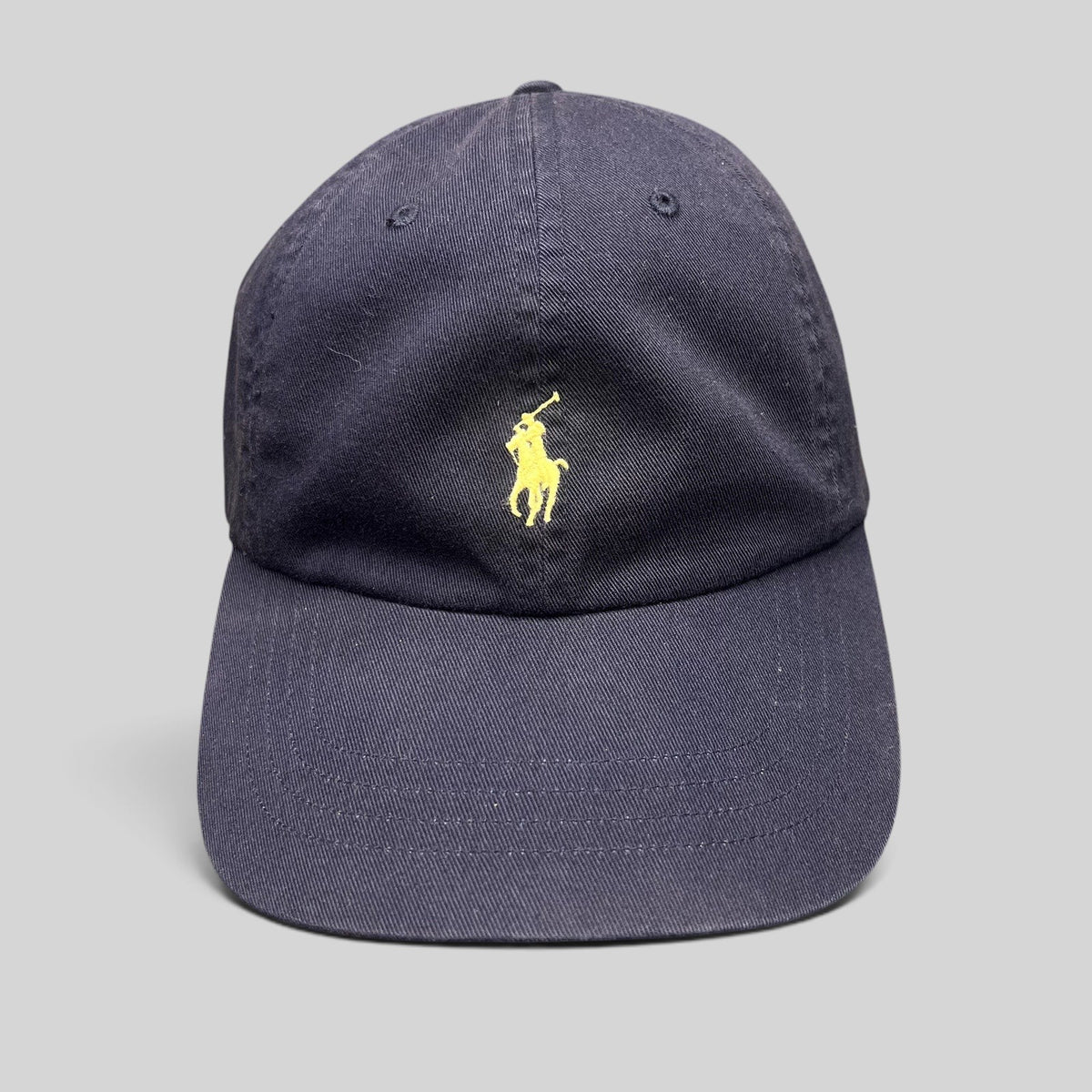 Raree Finds navy cotton chino baseball cap with a yellow embroidered Polo Ralph Lauren pony logo on the front