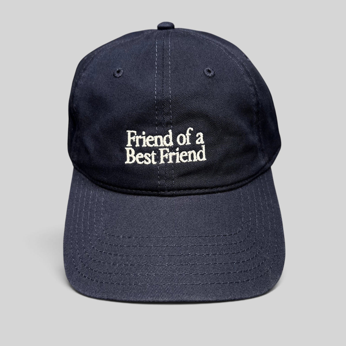 Raree Finds navy blue cotton twill dad hat with white Friend of a Best Friend embroidery and curved brim