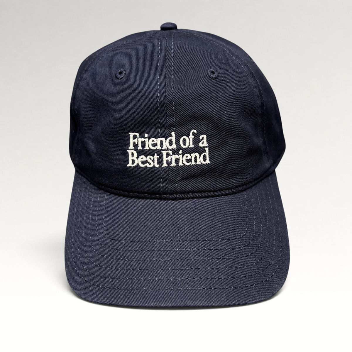 Raree Finds navy blue cotton twill dad hat with white Friend of a Best Friend embroidery and curved brim