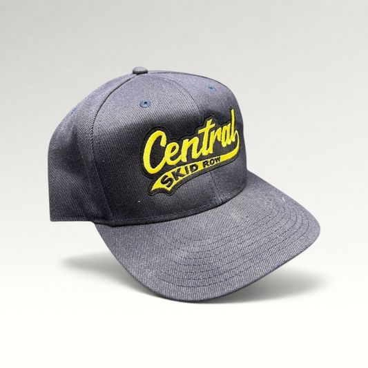 Raree Finds vintage 1990s navy blue denim snapback hat with yellow Central Skid Row embroidered script logo