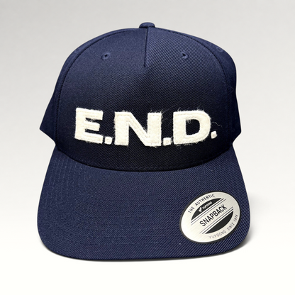 Raree Finds navy blue Yupoong Classics snapback hat with oversized white felt E.N.D. lettering on the front crown.