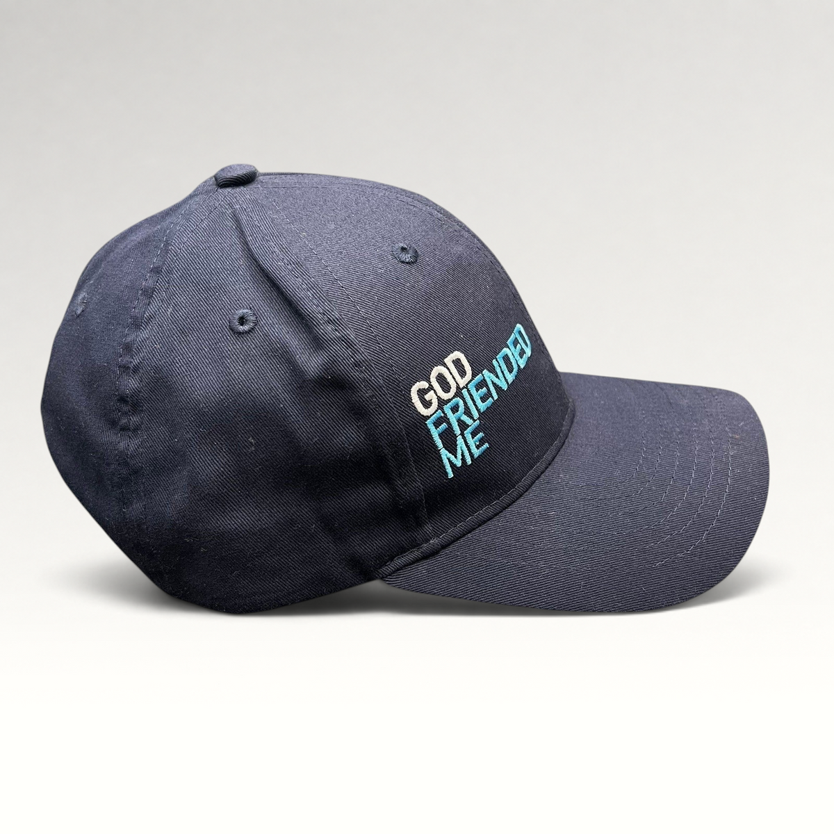 Raree Finds navy blue cotton strapback hat with God Friended Me embroidered logo from the TV show production.