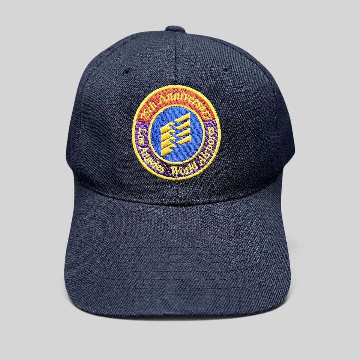 Raree Finds navy blue wool-blend strapback hat featuring an embroidered 75th Anniversary Los Angeles World Airports logo