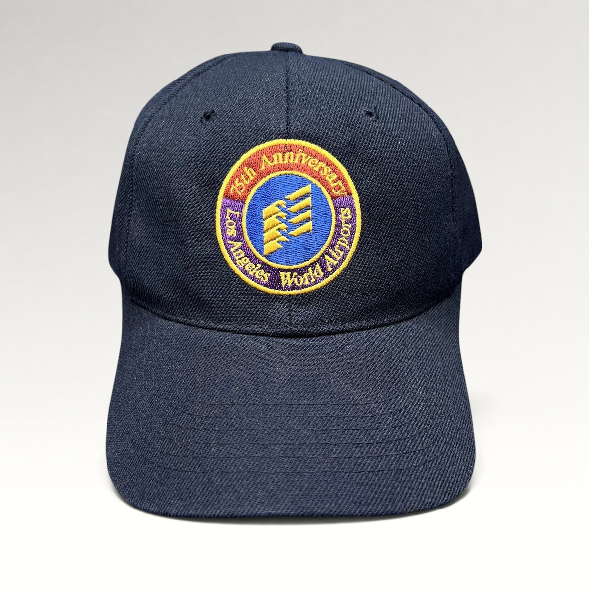 Raree Finds navy blue wool-blend strapback hat featuring an embroidered 75th Anniversary Los Angeles World Airports logo