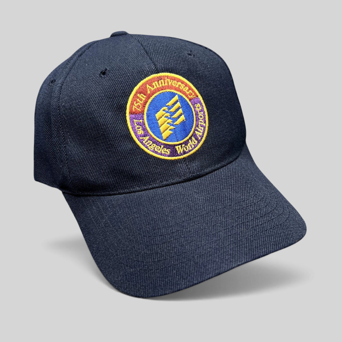 Raree Finds navy blue wool-blend strapback hat with an embroidered 75th Anniversary Los Angeles World Airports logo.