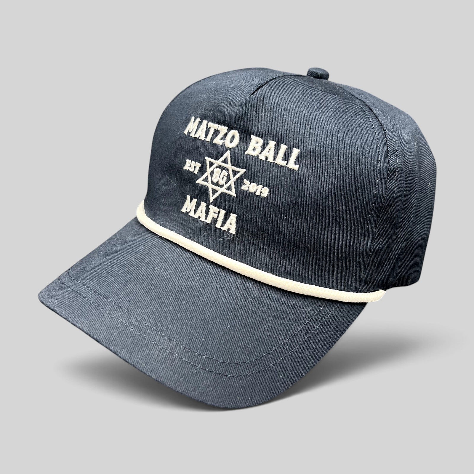 Raree Finds navy blue snapback rope hat with white Matzo Ball Mafia embroidery and Star of David detail.