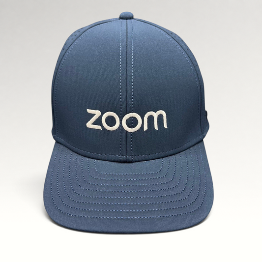 Raree Finds navy Melin Hydro A-Game snapback hat with white Zoom embroidery and laser-perforated performance fabric.