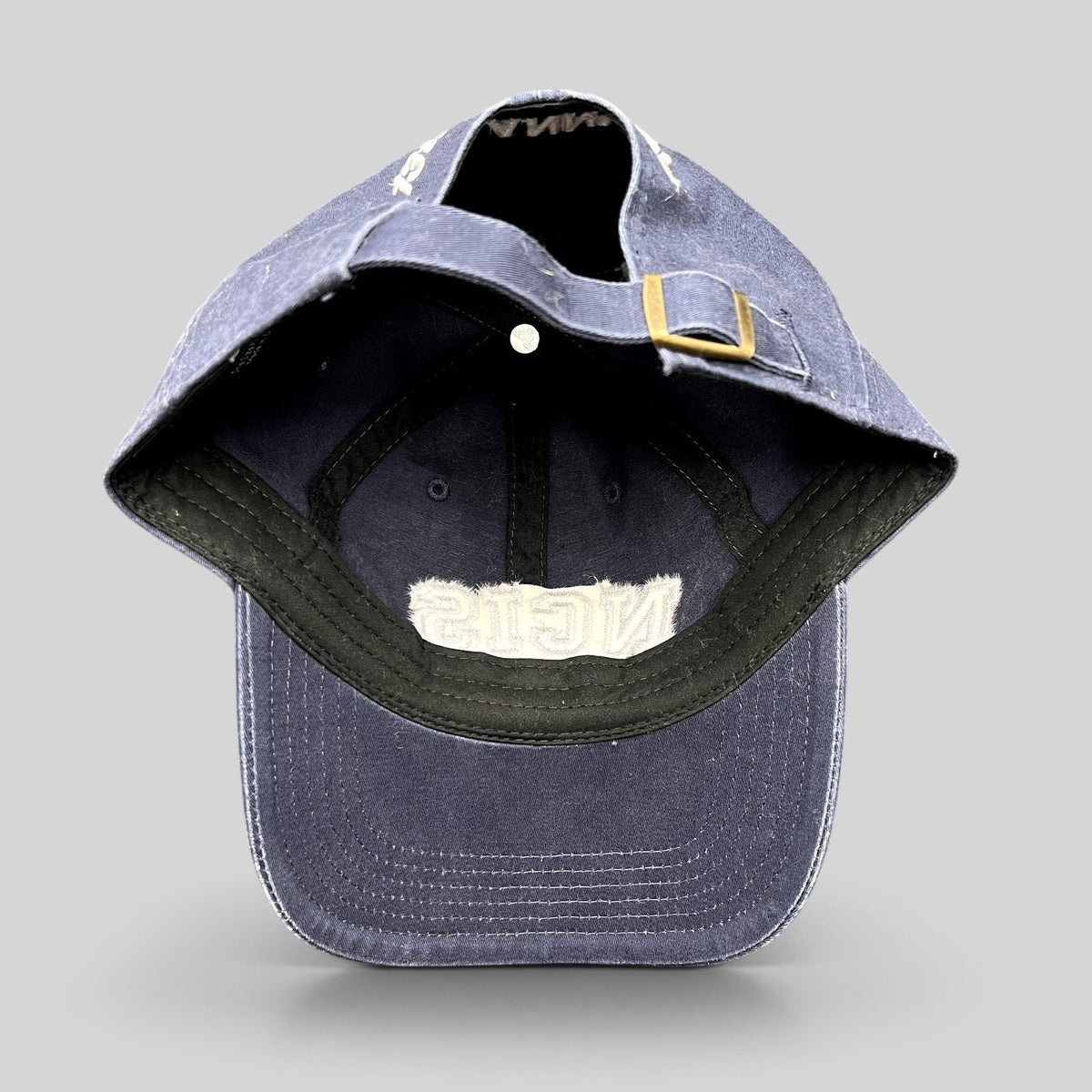 Raree Finds vintage navy blue NCIS golf tournament strapback hat with adjustable brass buckle closure