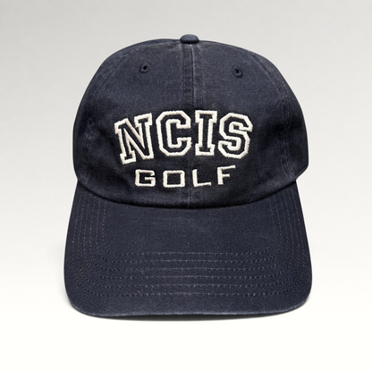 Raree Finds vintage navy blue NCIS Golf tournament strapback hat with white embroidered lettering on the crown.