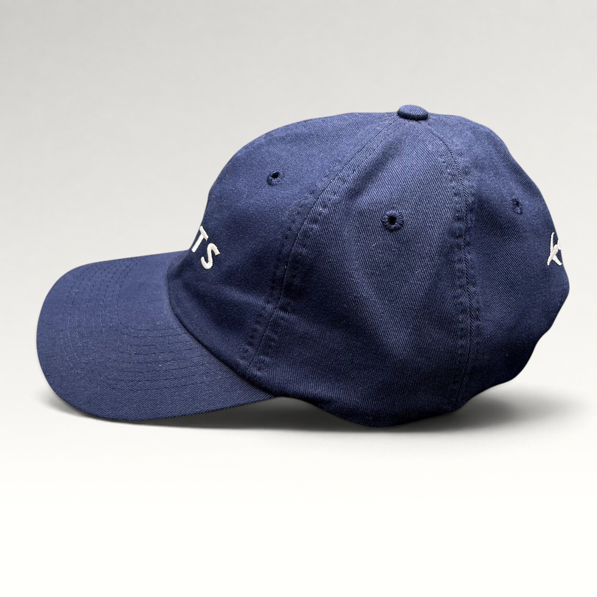 Raree Finds navy blue cotton strapback hat with NetJets logo embroidery and aviation-themed side detail