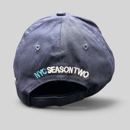 Raree Finds navy cotton strapback hat with NYC Season Two embroidery on the back, from God Friended Me production.