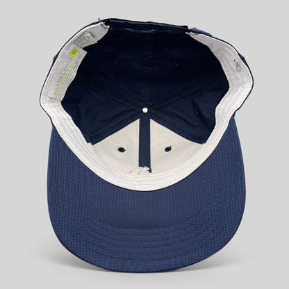 Raree Finds navy performance fabric cap interior view showing structured crown and Kate Lord branding label