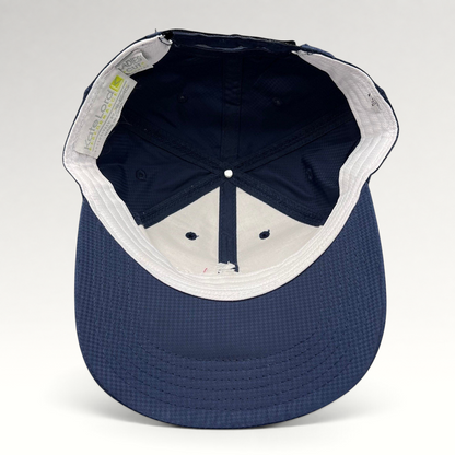 Raree Finds navy performance fabric cap interior view showing structured crown and Kate Lord branding label