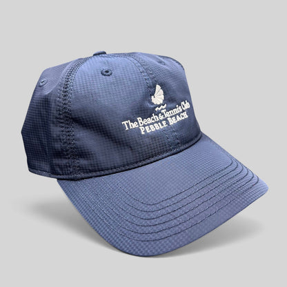 Raree Finds navy performance fabric cap with white embroidered Pebble Beach Beach & Tennis Club logo and curved brim