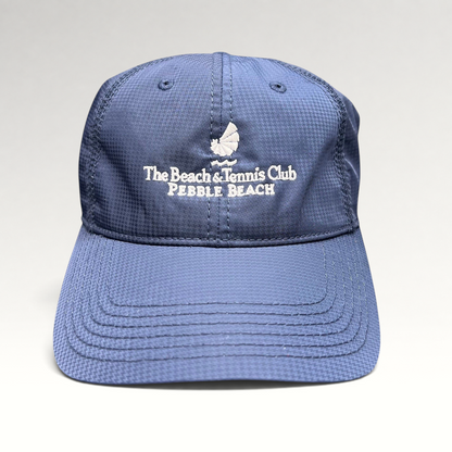 Raree Finds navy performance fabric hat with white Pebble Beach Beach & Tennis Club embroidery and adjustable strapback