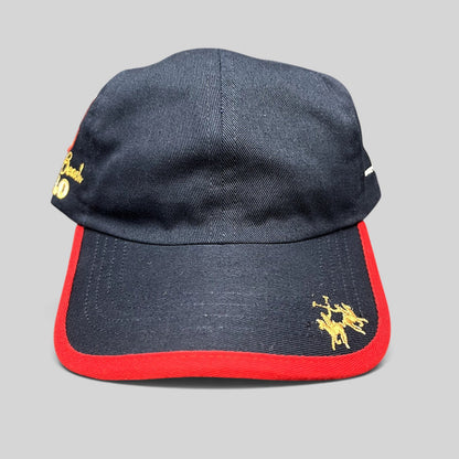 Raree Finds vintage navy blue cotton strapback hat with red brim piping, gold polo rider logo, and Miami Beach script.