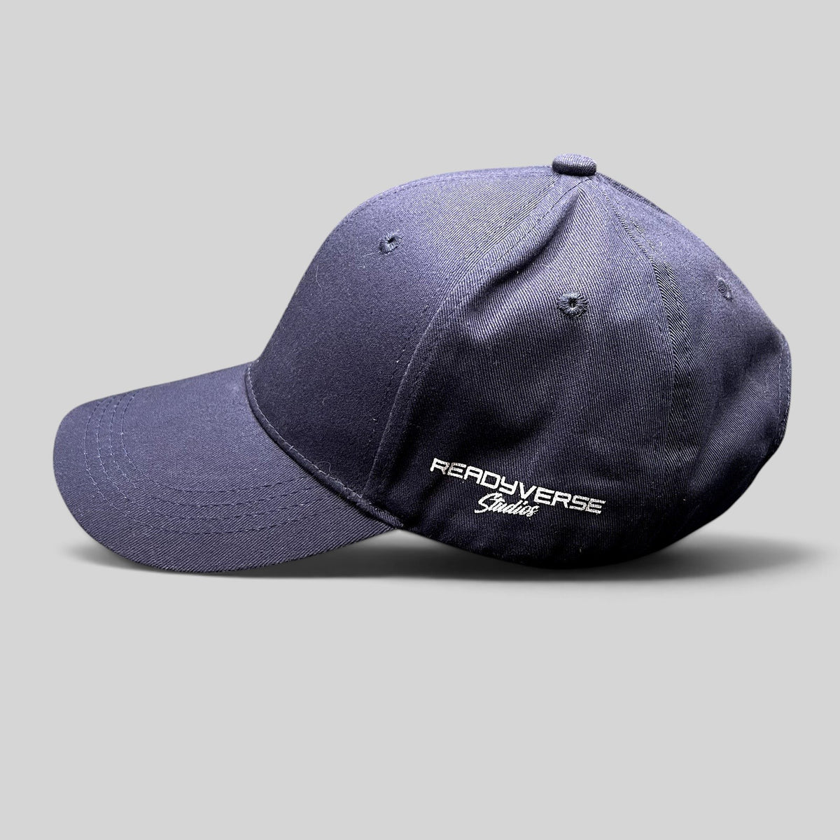 Raree Finds navy blue Readyverse Studios strapback dad cap with side logo embroidery and adjustable metal buckle