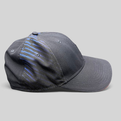 Raree Finds navy Oracle Red Bull Racing New Era 9FORTY snapback cap with blue side stripes and red brim trim