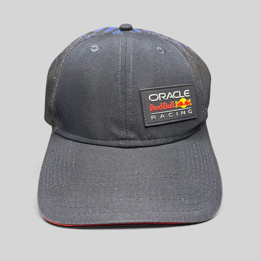 Raree Finds navy Oracle Red Bull Racing New Era 9FORTY snapback cap with a rubberized front logo and red brim trim.