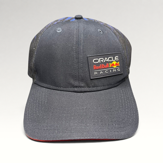 Raree Finds navy Oracle Red Bull Racing New Era 9FORTY snapback cap with a rubberized front logo and red brim trim.