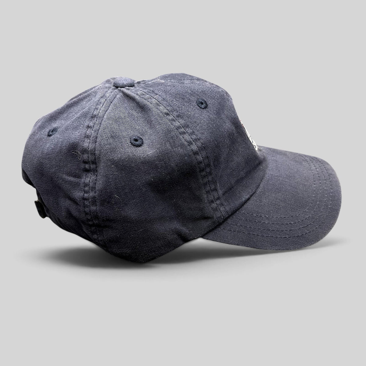 Raree Finds navy blue 2012 Rolex Newport Bermuda Race Week sailing cap with embroidered crest and green undervisor