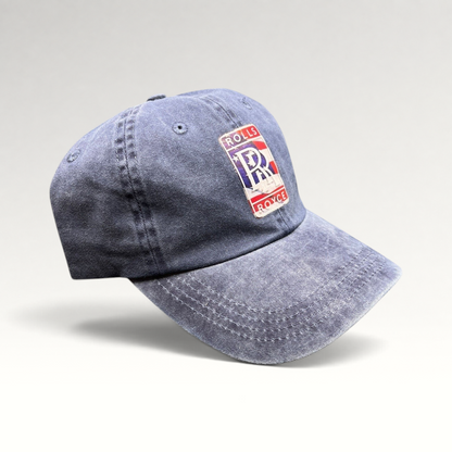 Raree Finds navy washed cotton dad hat with a patriotic Rolls-Royce crest patch and adjustable strap closure.