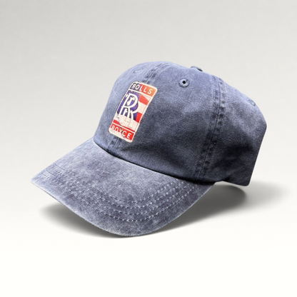 Raree Finds navy dad hat with a vintage-washed cotton finish and a patriotic Rolls-Royce USA crest patch.