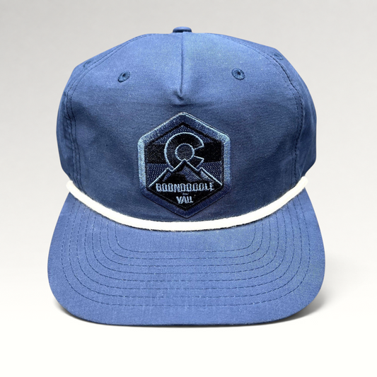 Raree Finds navy blue Boondoggle Vail snapback hat with white rope detail and Colorado mountain logo patch