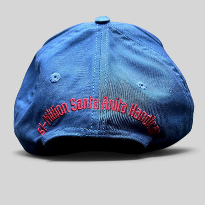 Raree Finds vintage navy snapback hat with red embroidered Santa Anita Handicap text on the back