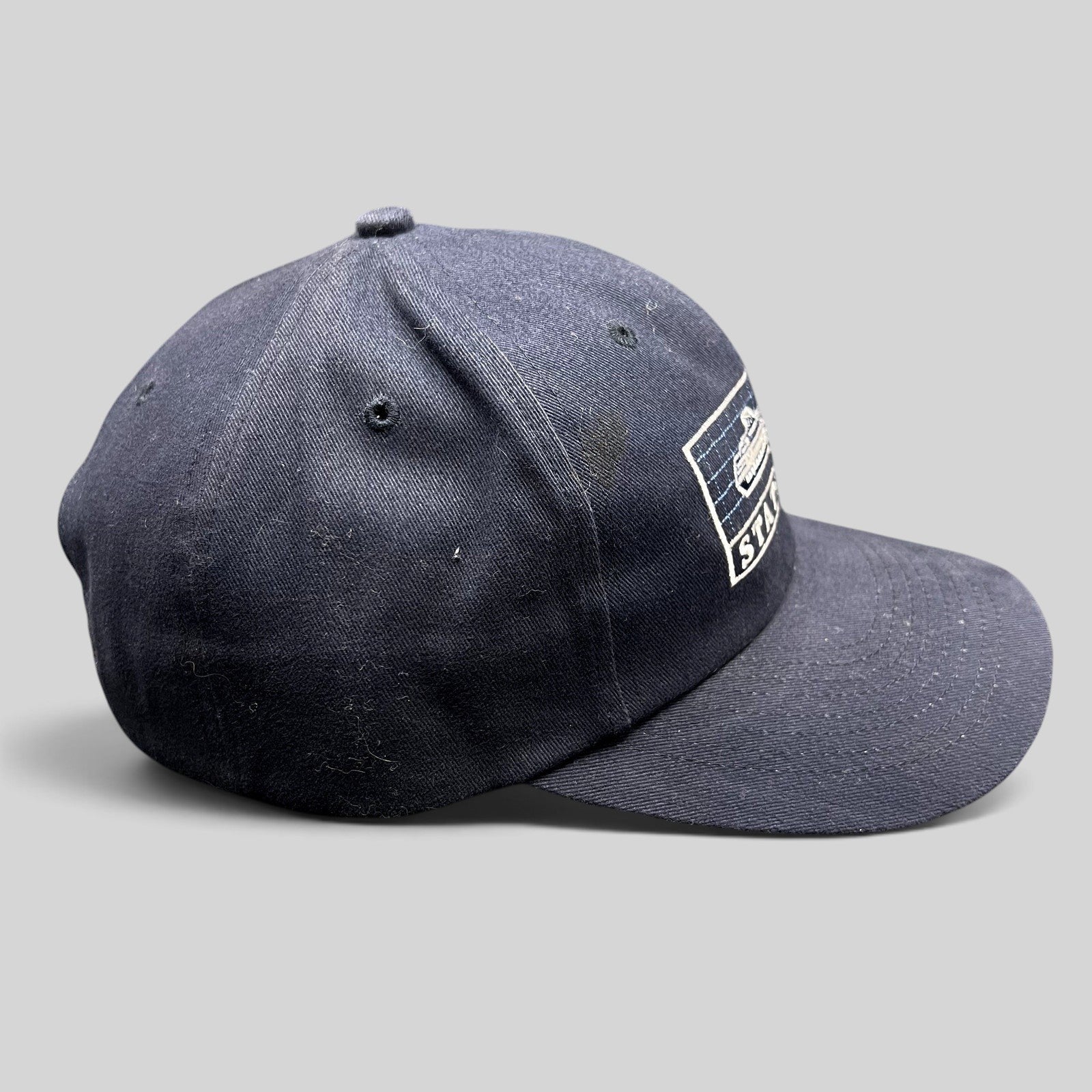 Raree Finds vintage navy blue cotton strapback hat featuring an embroidered Statendam cruise ship graphic