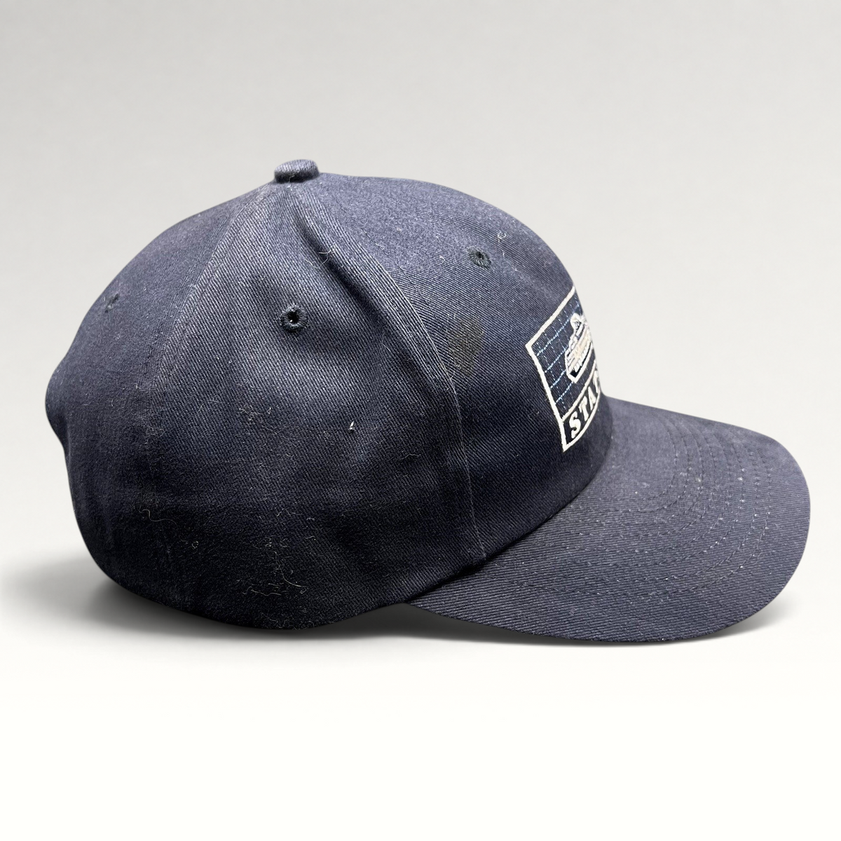 Raree Finds vintage navy blue cotton strapback hat featuring an embroidered Statendam cruise ship graphic