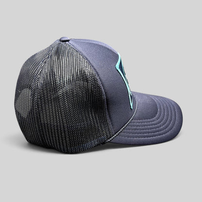 Raree Finds navy blue Friday Feelin’ trucker hat with mesh back and alpine-inspired embroidered patch, side view.