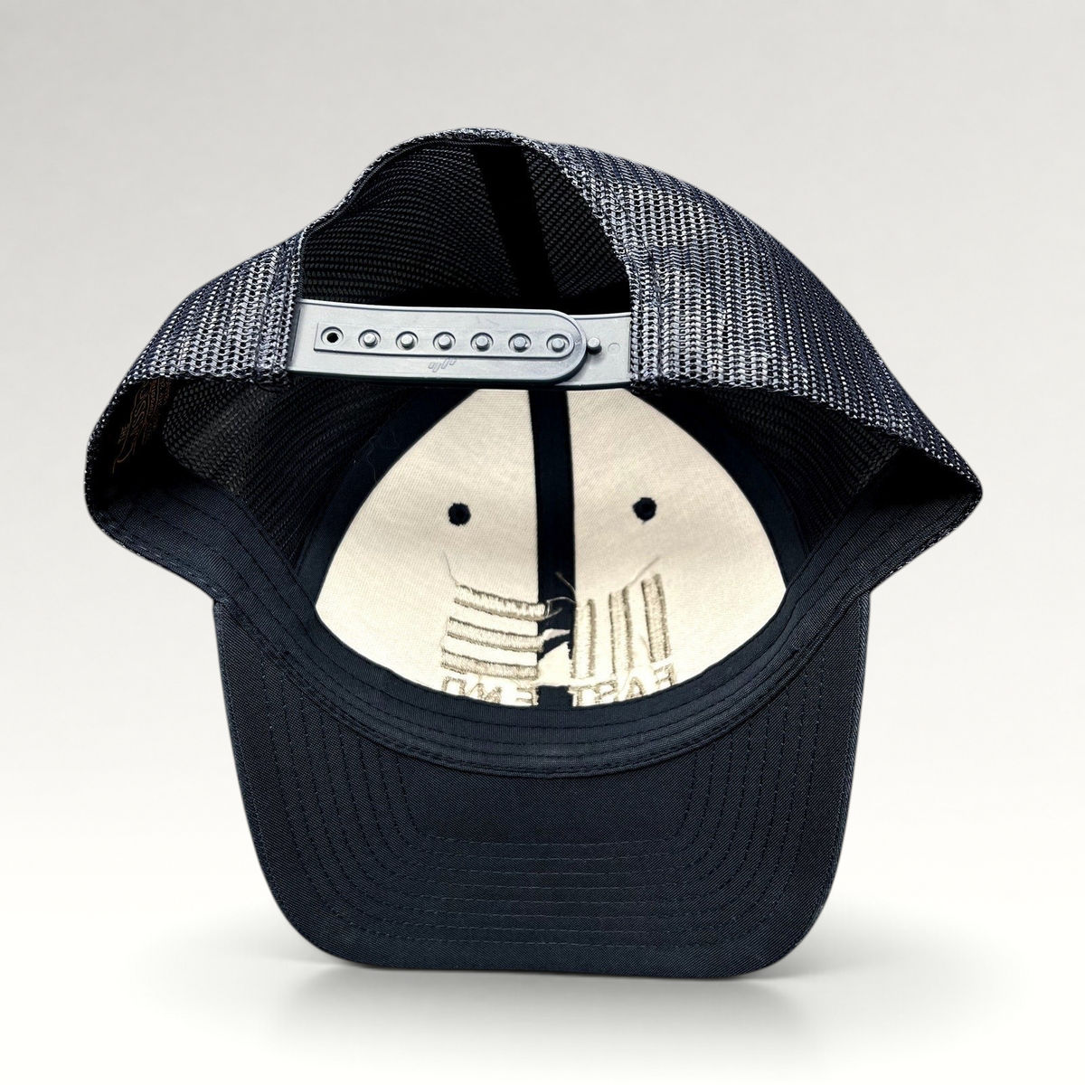 Raree Finds navy blue Yupoong Classics trucker snapback hat with mesh back and adjustable strap, rear view