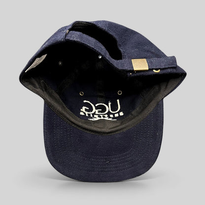 Raree Finds vintage navy blue cotton UGG Australia strapback hat with embroidered logo and brass buckle closure