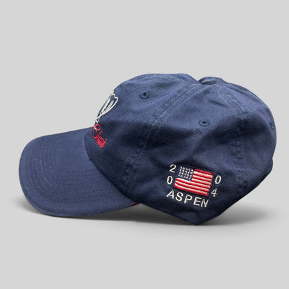 Raree Finds navy blue vintage strapback hat with 2004 Aspen American flag embroidery and golf tournament branding