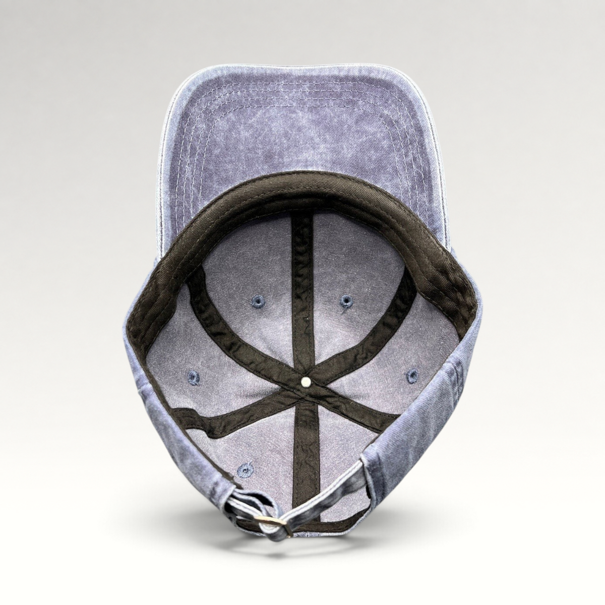 Raree Finds navy washed cotton dad hat with adjustable strap and unstructured crown, interior view