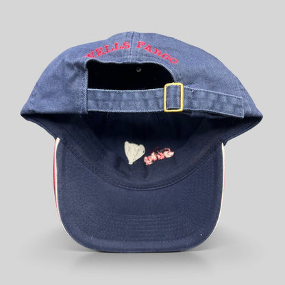 Raree Finds vintage navy blue Wells Fargo strapback golf hat with brass buckle and red rear embroidery