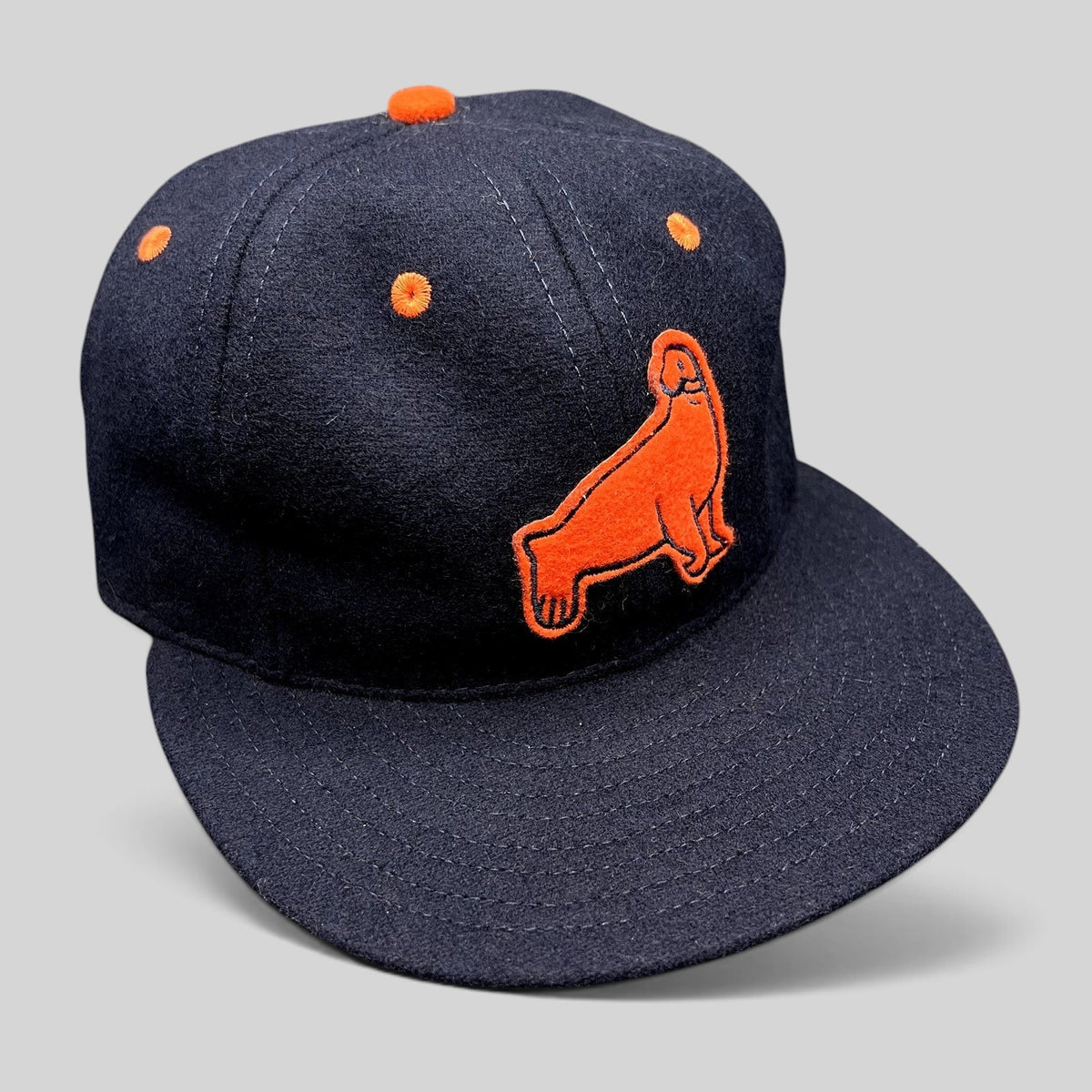 Raree Finds navy wool San Francisco Seals baseball cap with orange felt logo and eyelets