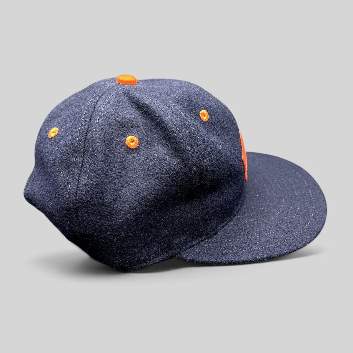 Raree Finds navy wool San Francisco Seals baseball hat with orange embroidery and eyelets, side view