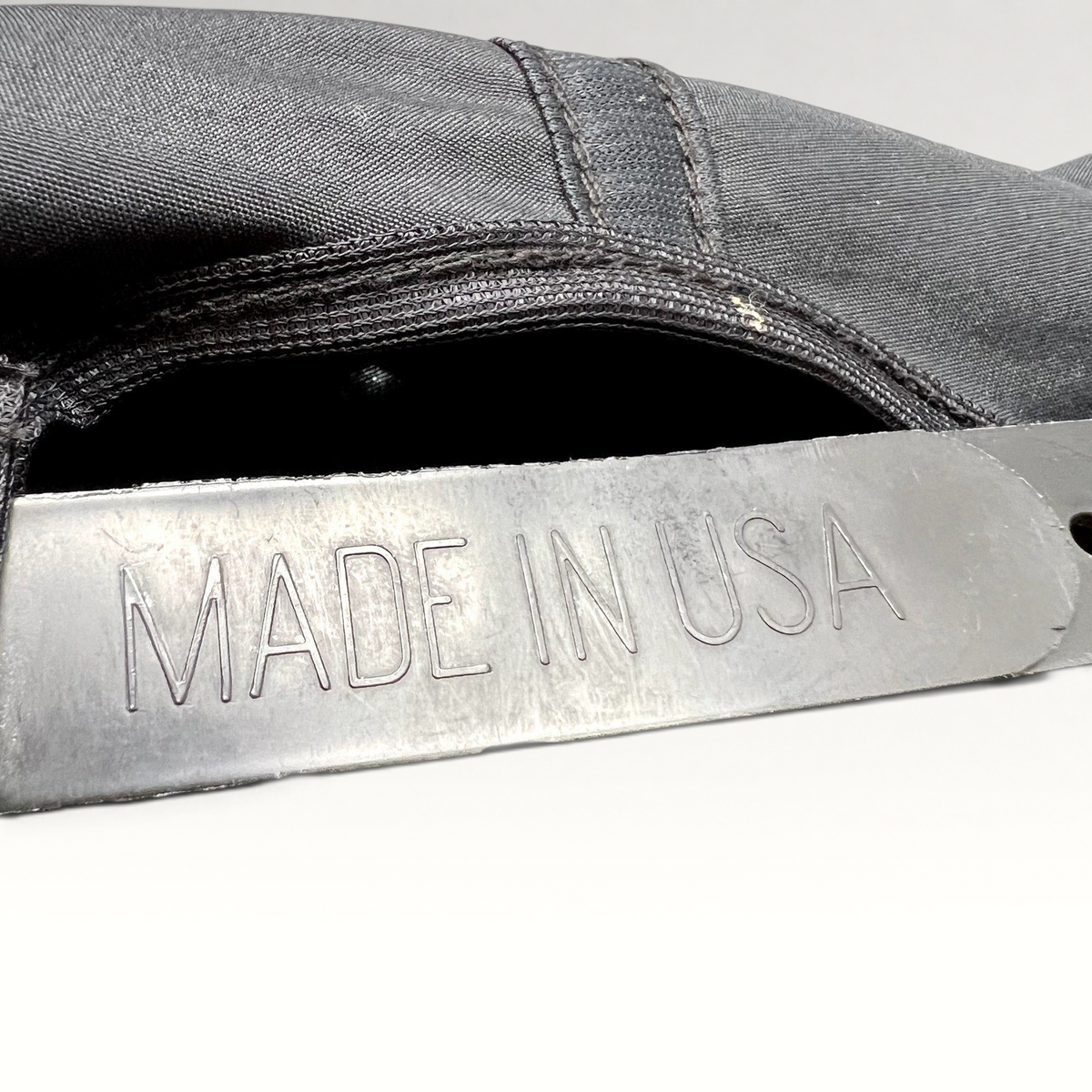 Raree Finds vintage 90s NBC News snapback hat showing the Made in USA stamp on the black nylon adjustable strap