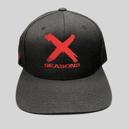 Raree Finds NCIS Los Angeles X Seasons black snapback hat with distressed red embroidered logo and green undervisor