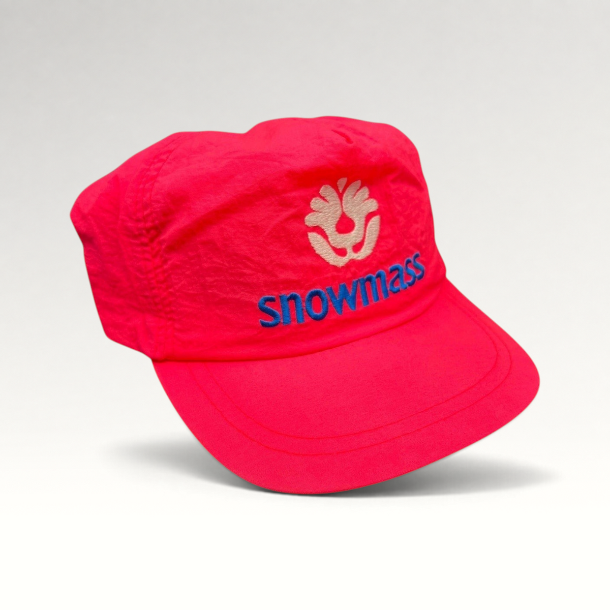Raree Finds vintage 80s neon pink nylon Snowmass ski hat with white tree logo and blue embroidery