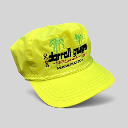 Raree Finds vintage neon yellow nylon Darrell Gwynn Racing snapback hat with embroidered palm trees and braided rope.
