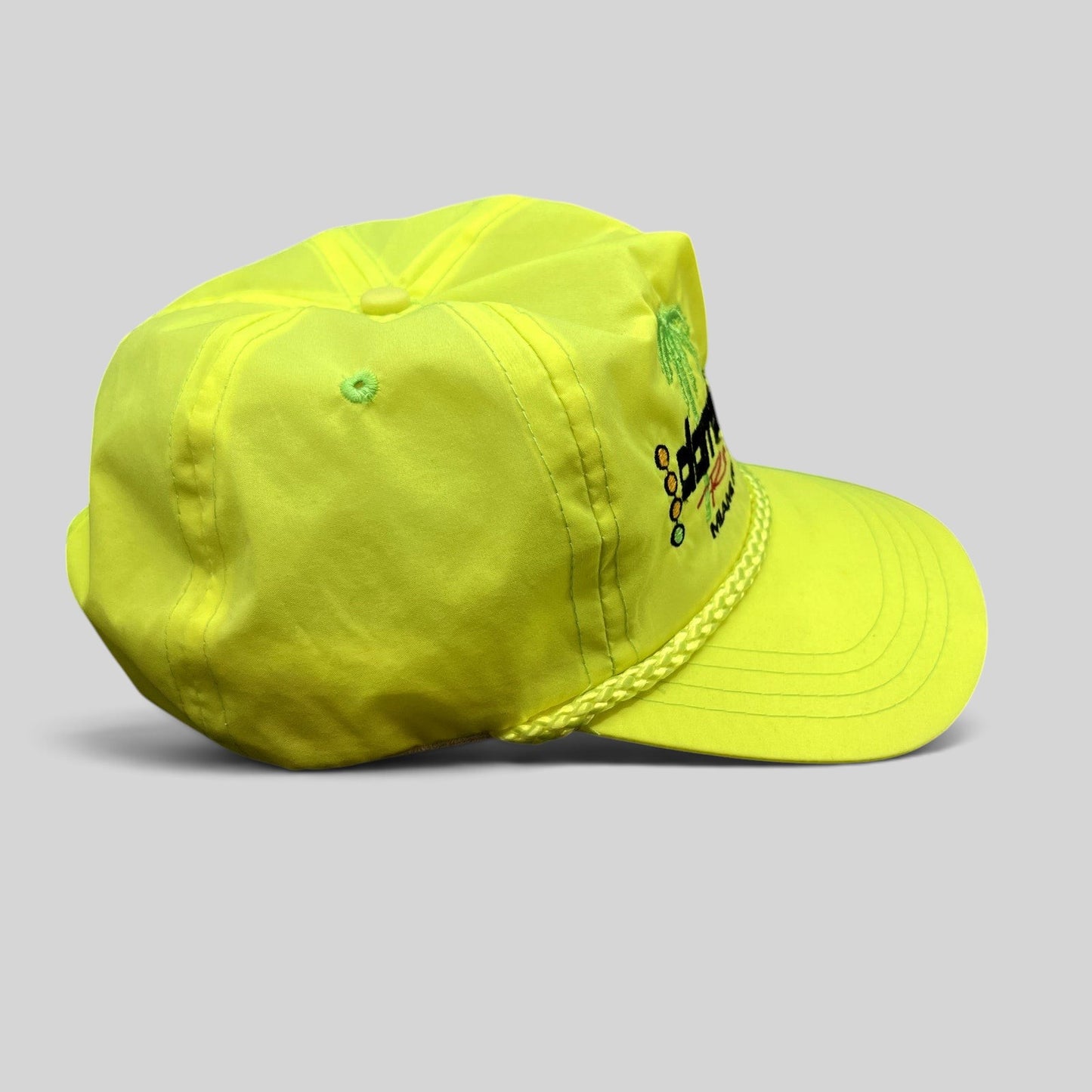 Raree Finds vintage neon yellow Darrell Gwynn Racing nylon snapback hat with embroidered palm trees and braided rope.