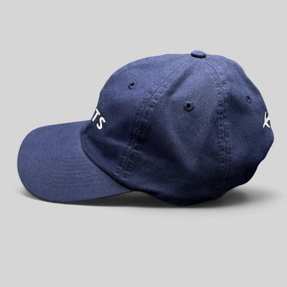 Raree Finds navy blue cotton NetJets strapback hat with side view showing embroidered logo and aviation detail