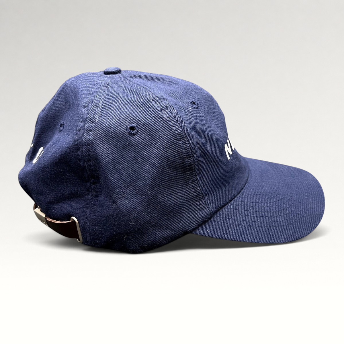 Raree Finds navy blue cotton strapback hat with NetJets logo and premium genuine leather adjustable strap
